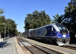 Charger # 2106 is on the rear of Amtrak Capitol Corridor Train # 734 as it discharges passengers at Davis Station